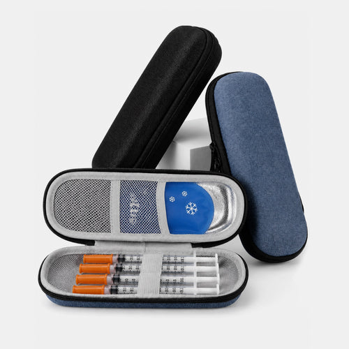 The Pepkase Travel Case shown standing upright next to daily supplies